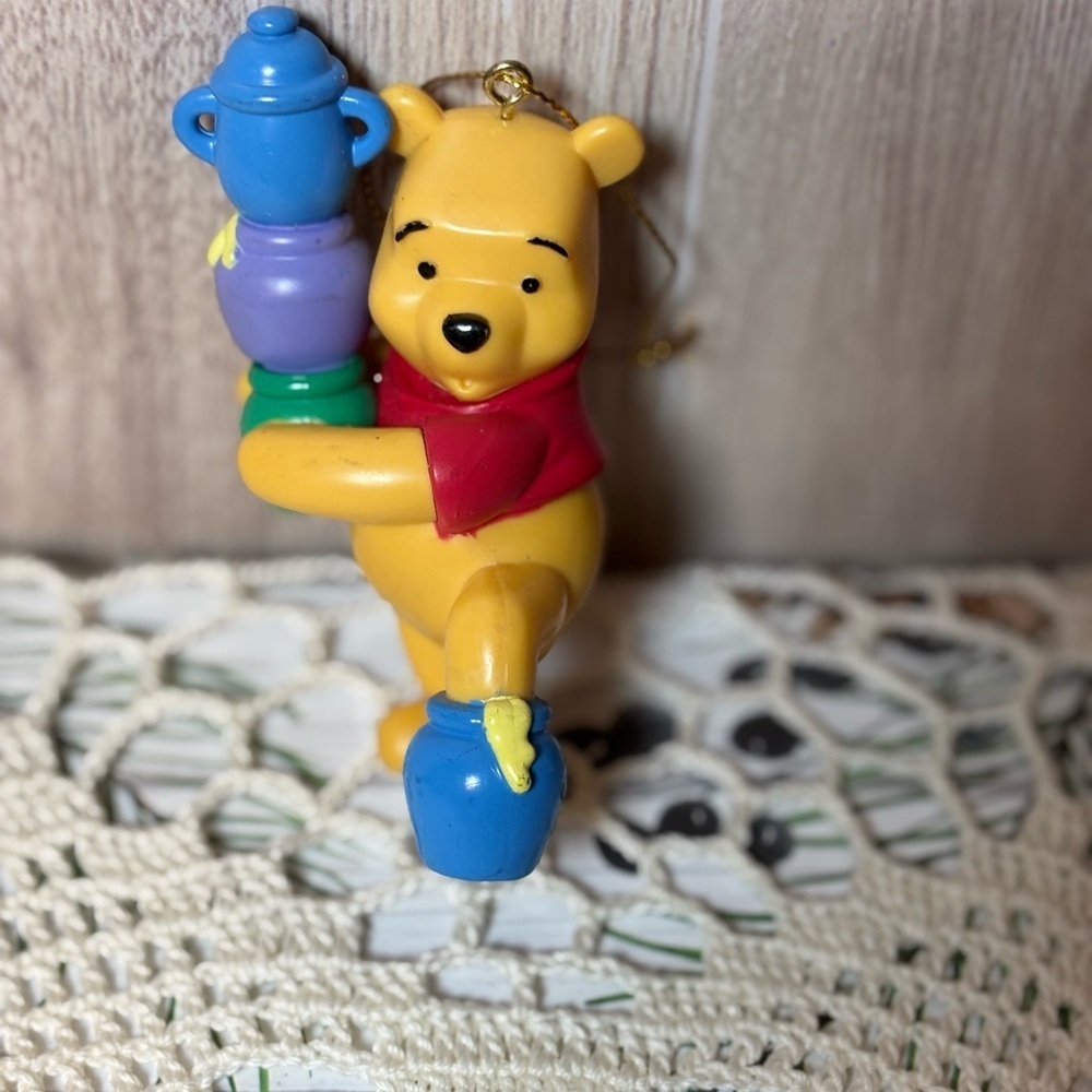 Charming Winnie the Pooh Christmas Ornament with Red and Blue Accents
